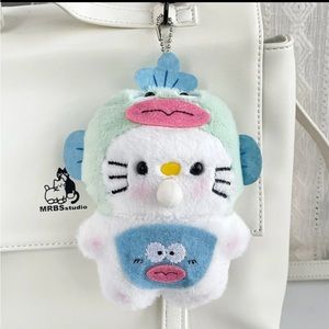 Hello kitty dressed as Hangyodon Fishman keychain plushie